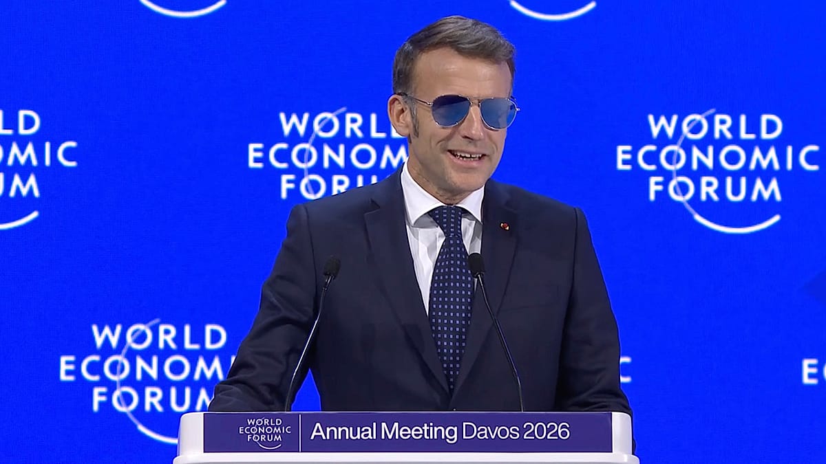 We do prefer respect to bullies, Macron says at Davos as Trump tensions mount