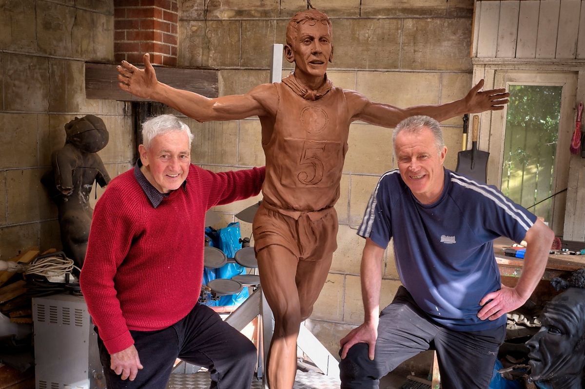 Jim Alder with the statue commemorating his Commonwealth Games gold medal and sculptor Tom Maley