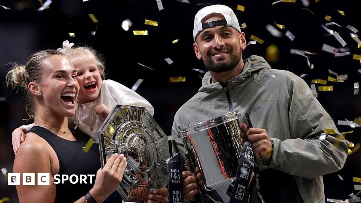 Aryna Sabalenka and Nick Kyrgios hug at the net