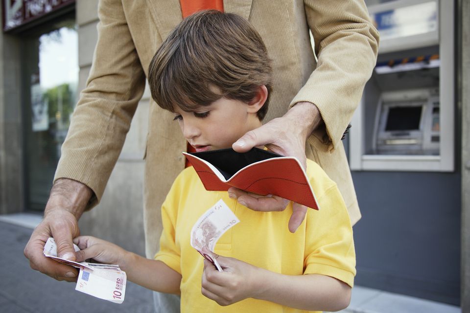 When children first come into money, where should you instruct them to store it? Photo: Getty.