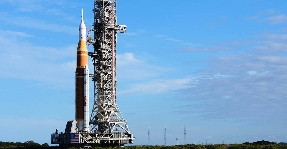 Nasa rolls out rocket for first mission in decades to take crew around moon