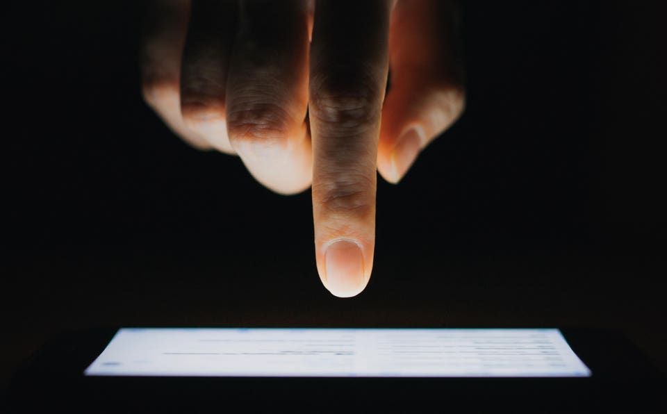 Close up of woman's hand on phone.