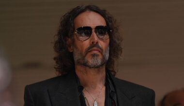 Russell Brand granted bail after being charged with two more sexual assault offences, including rape