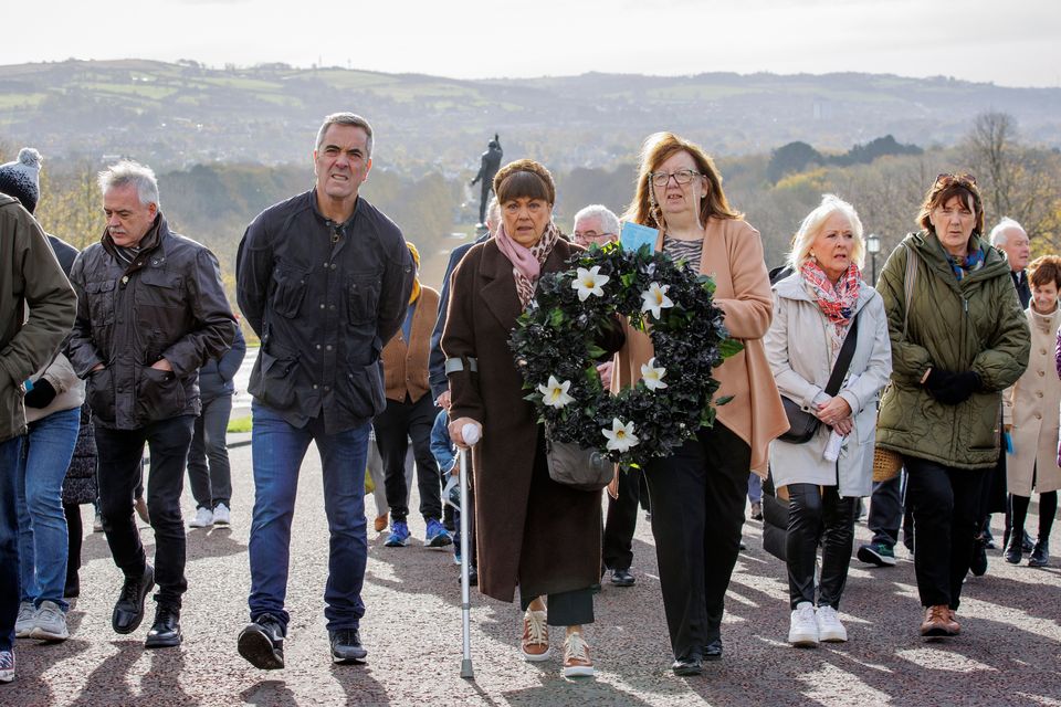James Nesbitt (centre left) walking with Joe Lynskey's niece Maria Lynskey (centre) and Columba McVeigh's sister Dympna Kerr (centre right) during the 17th annual All Souls Silent Walk for the Disappeared at Stormont.. Liam McBurney/PA Images via Getty Images