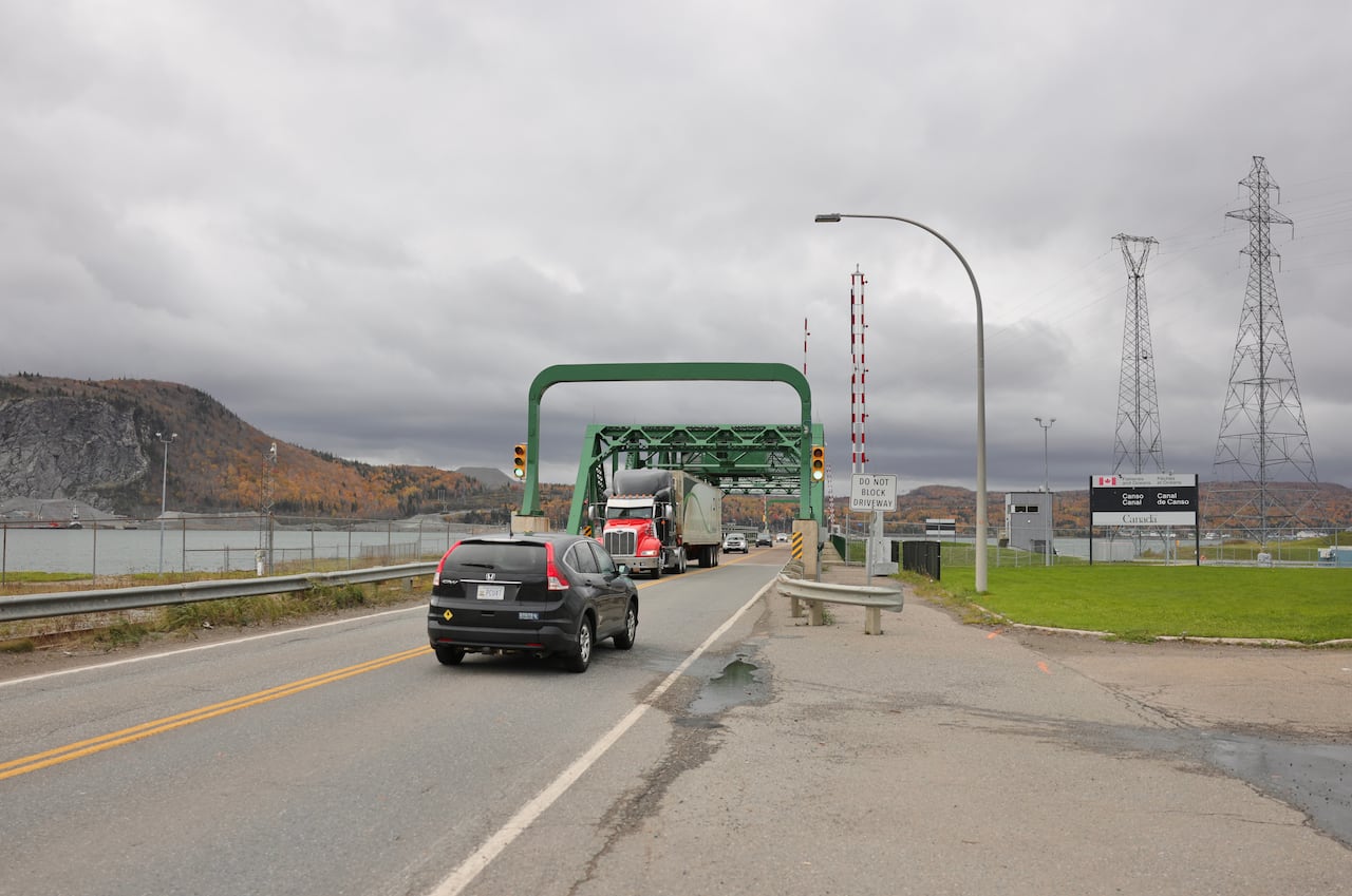 Cars cross a bridge