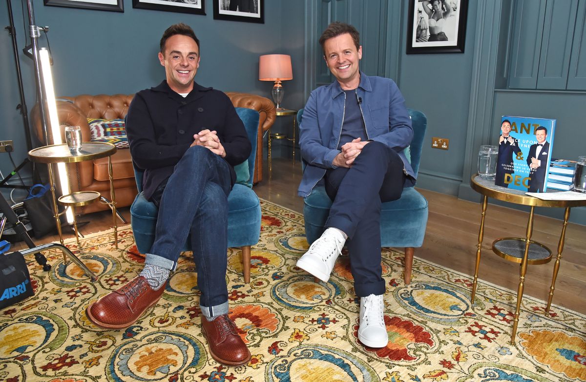 Anthony McPartlin and Declan Donnelly sitting backstage