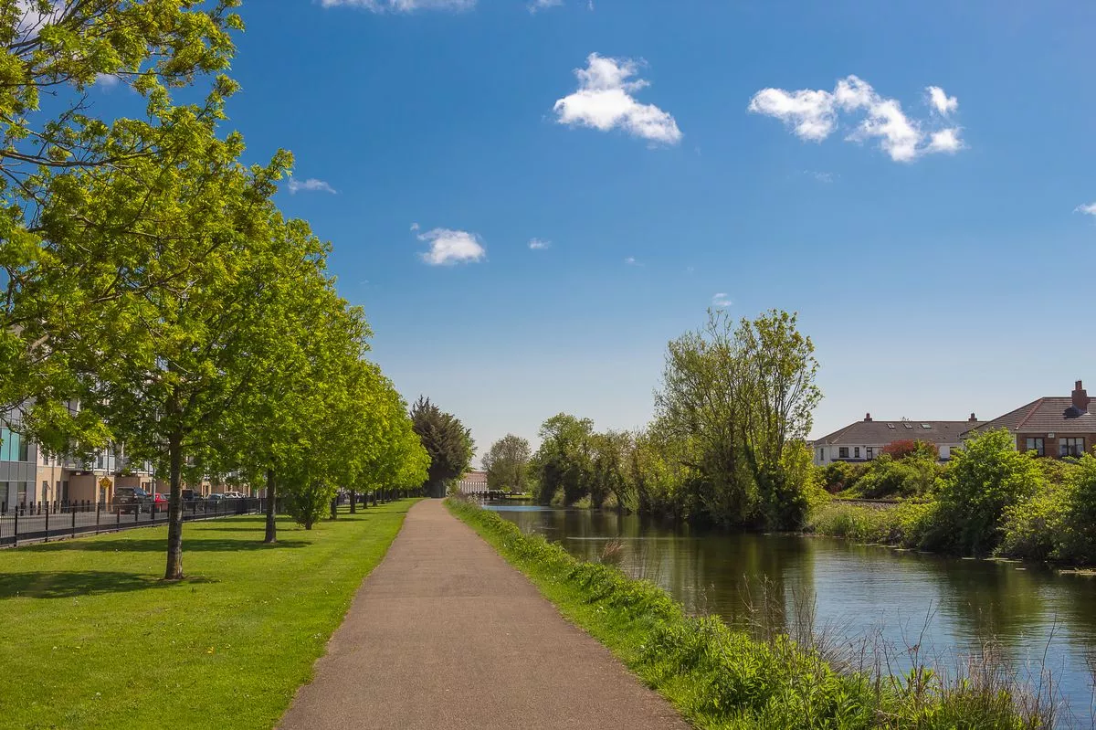Empty Royal Canal Bank Park in Dublin on a sunny day with a clear sky