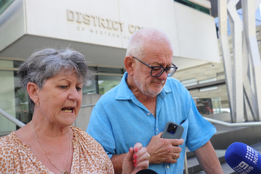 Wendy and Stephen speak outside court, looking distraught.