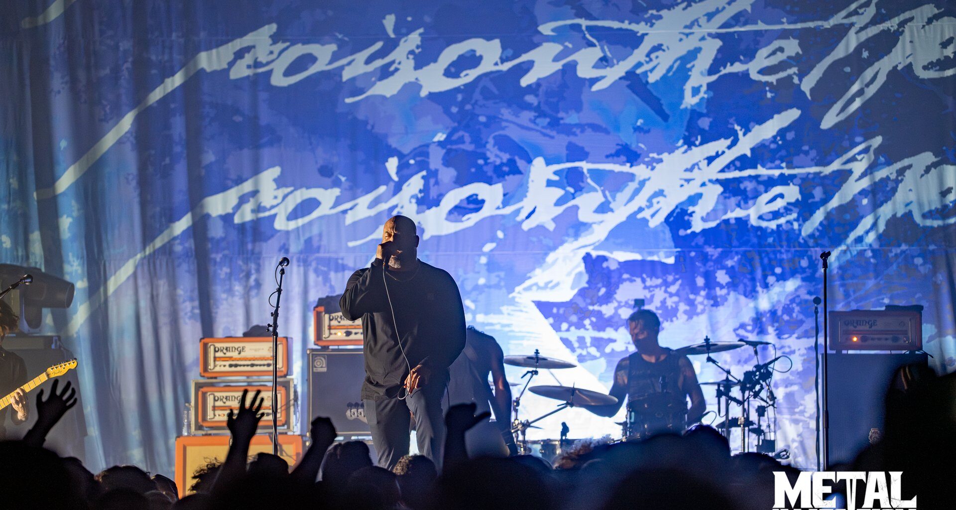 A photo of the band Poison The Well live.