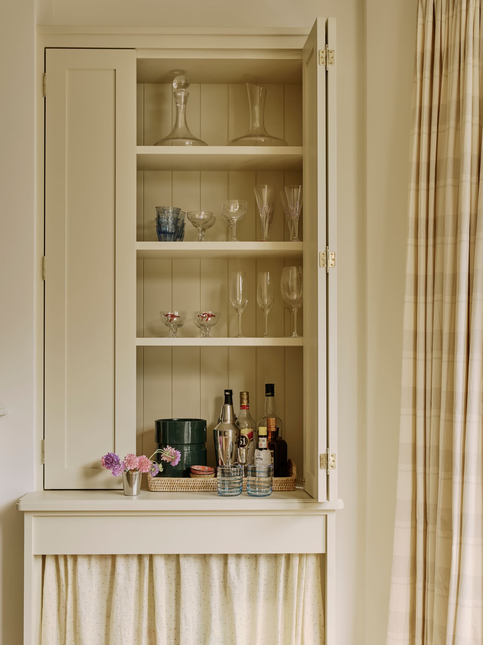 Image may contain Furniture Closet Cupboard Cabinet Cup and Shelf