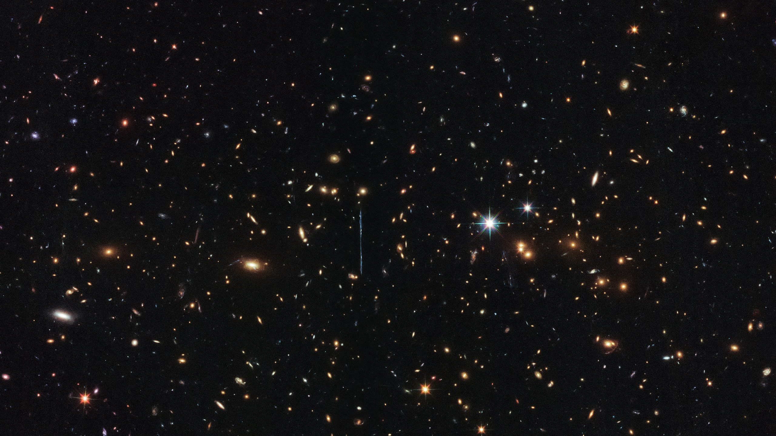 An image of El Gordo, a massive galaxy cluster captured by Hubble