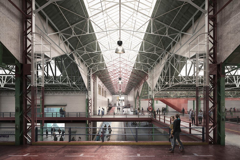 Large indoor space with high ceilings and exposed structure, occupied by people. Large indoor space with high ceilings and exposed structure, occupied by people.