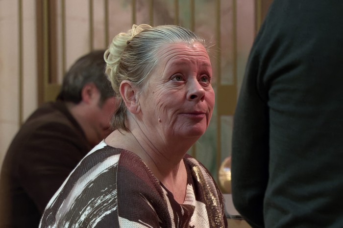 29_01_coro_mal_bernie_02 Bernie looks sad, looking upwards and sat at the Chariot Square bar in a scene from Coronation Street