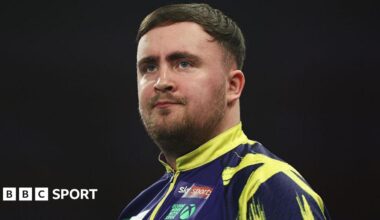 Luke Littler looks pensive during his Bahrain Masters defeat by Gerwyn Price