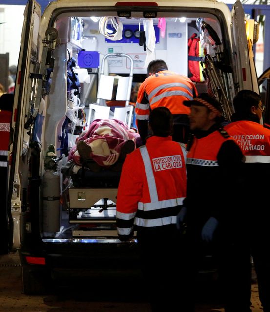 People affected by a deadly train derailment are transferred and treated at the Caseta Municipal in the town of Adamuz, after a high-speed train derailed and collided with another approaching train near Cordoba, Spain, January 18, 2026. REUTERS/Alex Gallegos