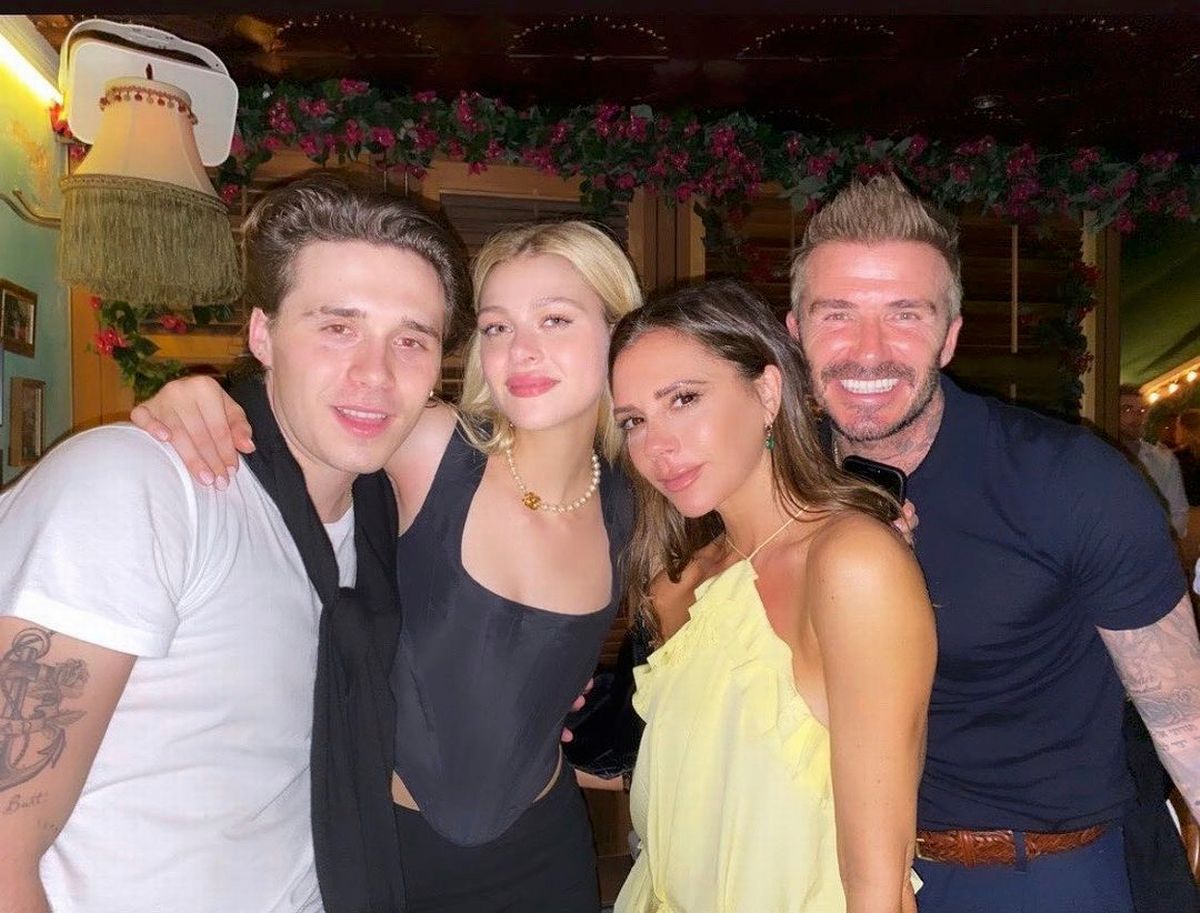 Brooklyn and Nicola pictured with David and Victoria in happier times