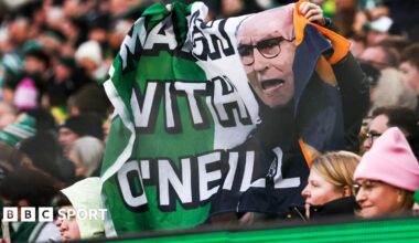 Celtic fans with a Martin O'Neill banner