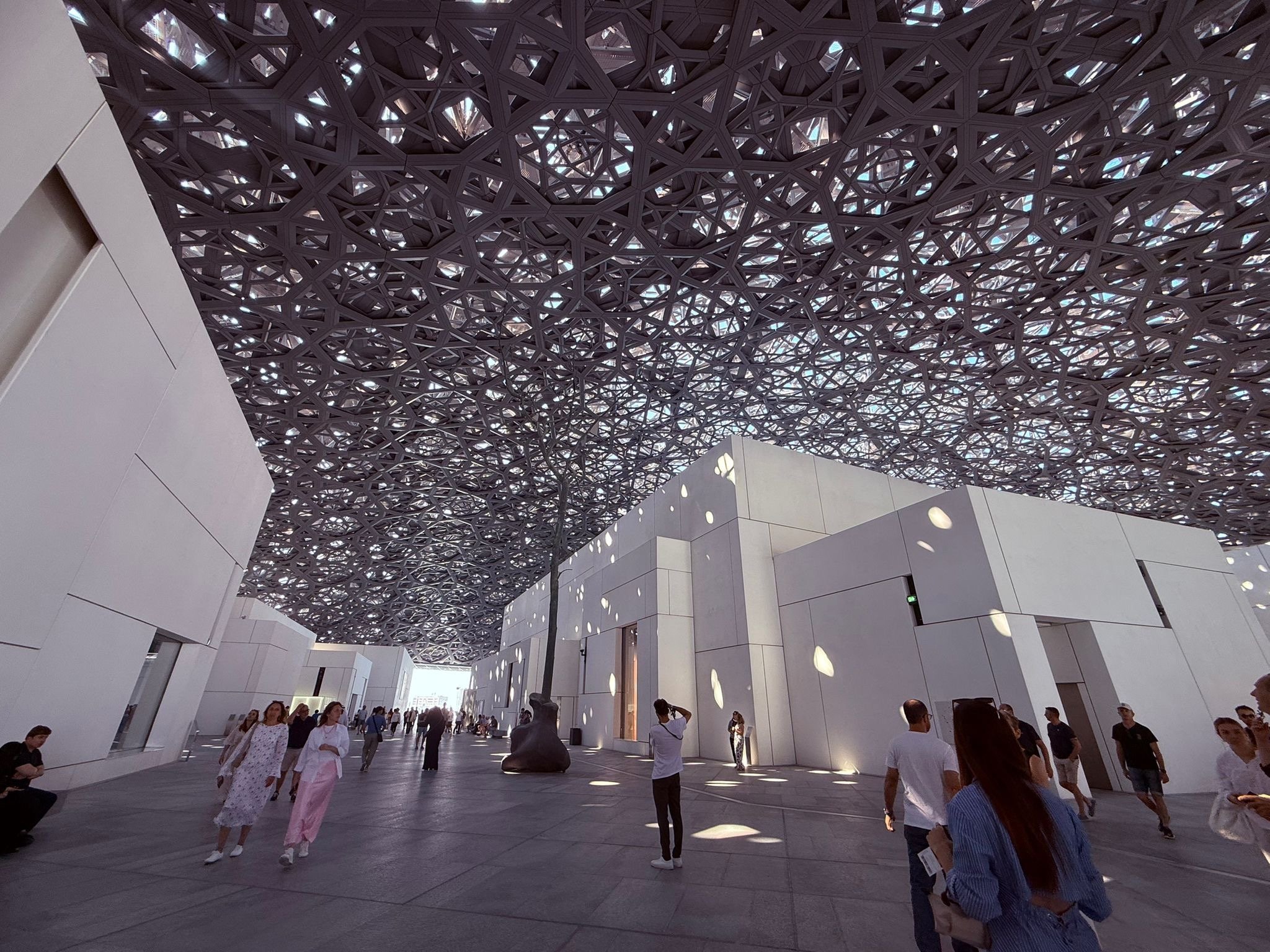 Visitors explore the Louvre Abu Dhabi, Abu Dhabi, United Arab Emirates, Dec. 7, 2025. (Photo by Funda Karayel)