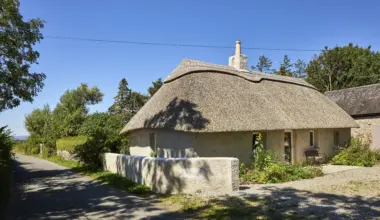 An architect has gently restored her thatched Tipperary cottage to improve flow