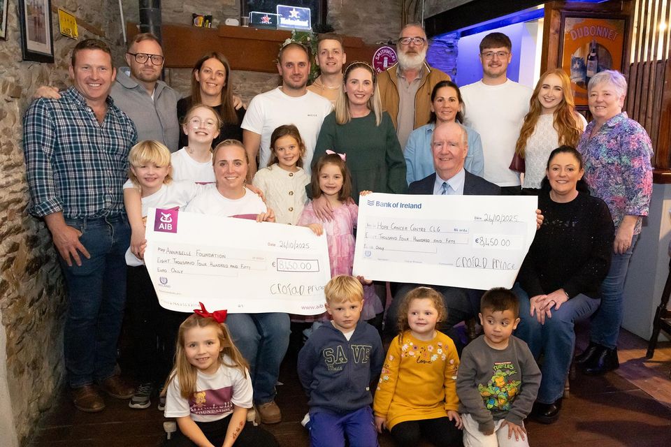 Croía Delaney Prince who donated her hair for charities photographed with her family and friends. Presentations made to Helena Kehoe from Annabelle foundation and David Minogue of HOPE centre in the Hillside bar. Photo; Mary Browne