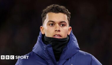 Brennan Johnson wearing a coat and snood