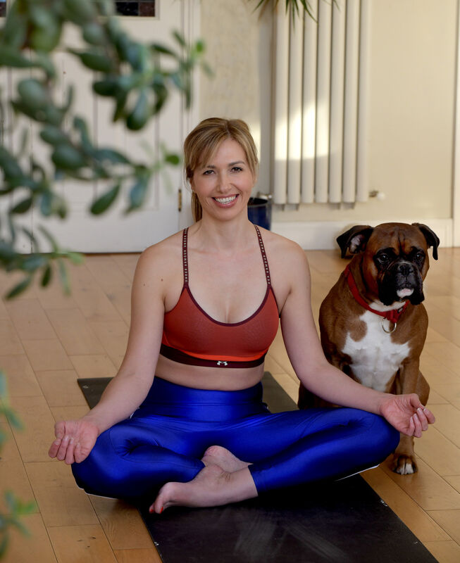  Laura Dowling exercising in her kitchen. Photograph: Moya Nolan