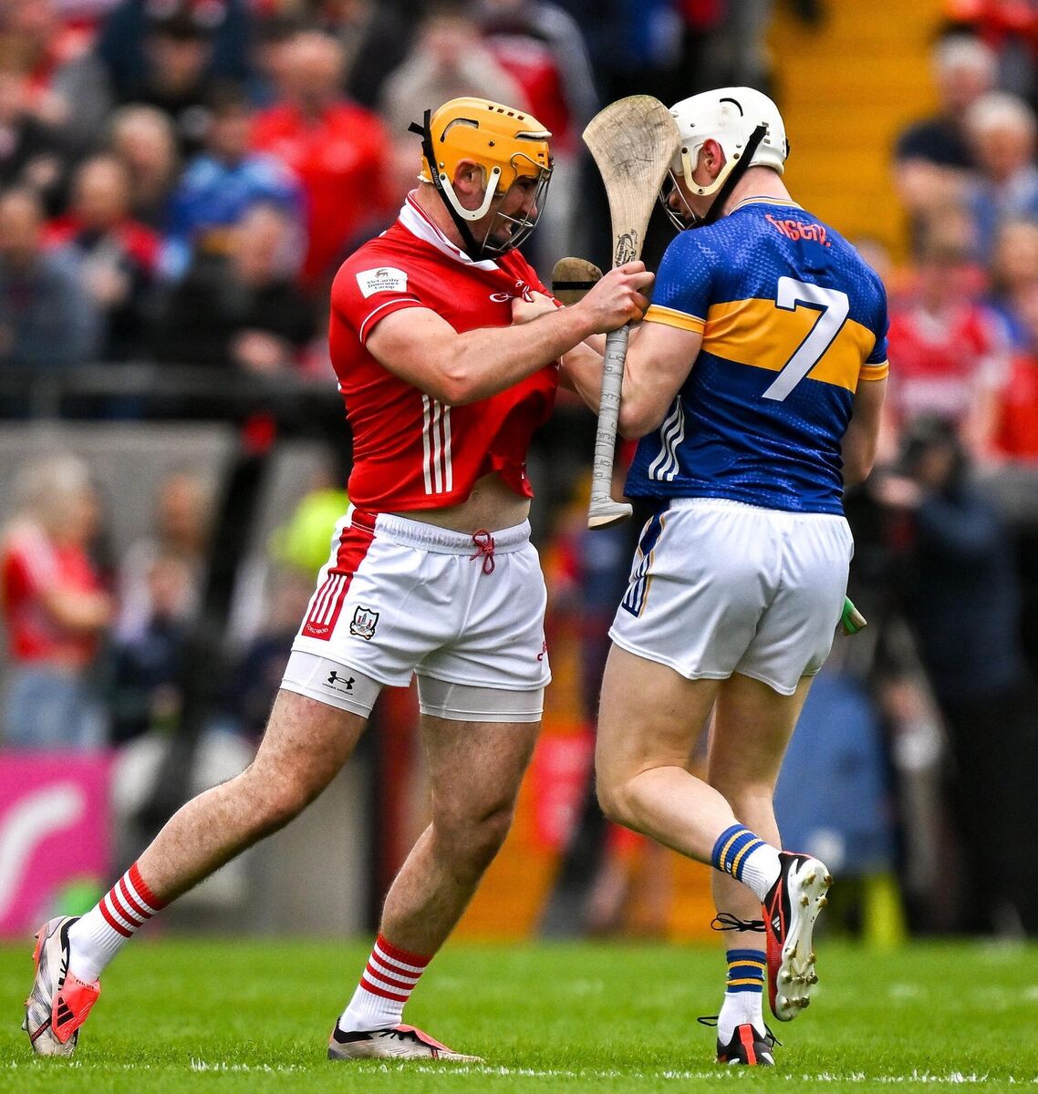 Declan Dalton of Cork and Bryan O'Mara of Tipperary tussle before throw in during the Munster GAA Hurling Senior Championship Round 2 match at SuperValu Páirc Uí Chaoimh. Picture: Brendan Moran/Sportsfile