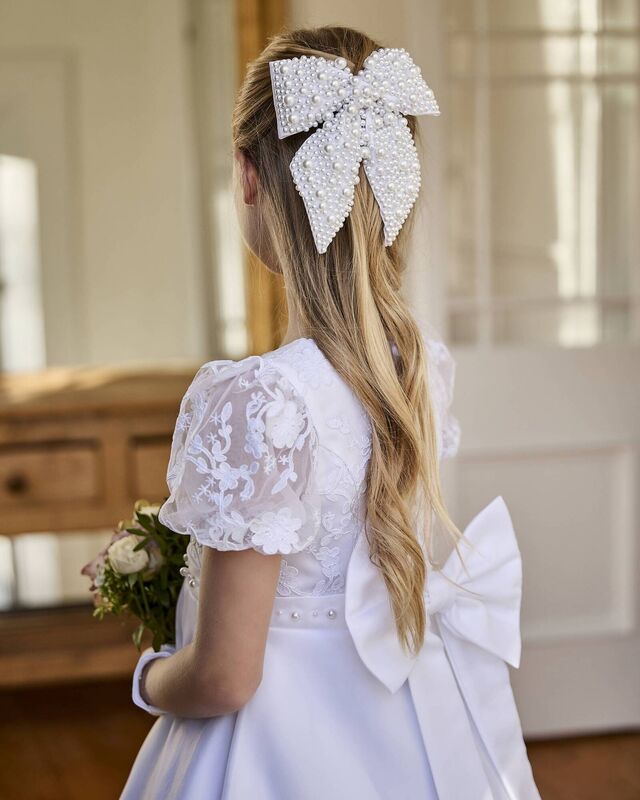 Paul Costelloe Holy Communion collection.