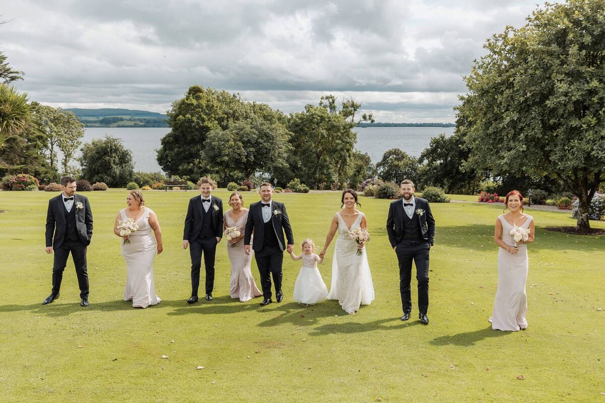 Aine Keogh and Dessie Lennon with members of their wedding party. Pictures: Hu O’Reilly Photography