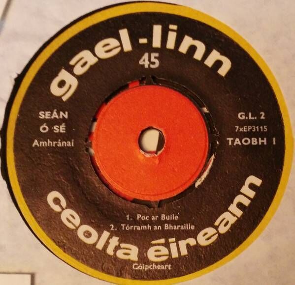 An Poc ar Buile by composer Dónall Ó Mulláin, and tenor Seán Ó Sé.