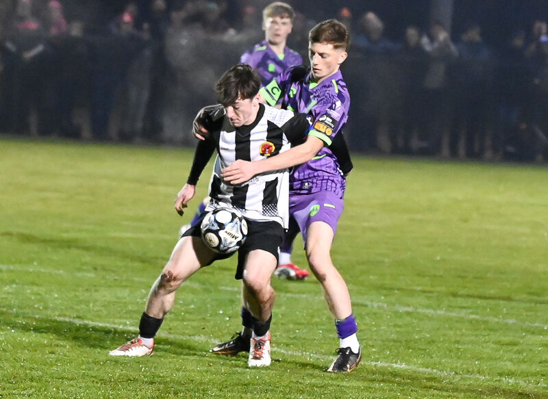  Midleton's Liam Lynch in a tussle with Cork City's Darragh McCormick. Picture: David Keane.