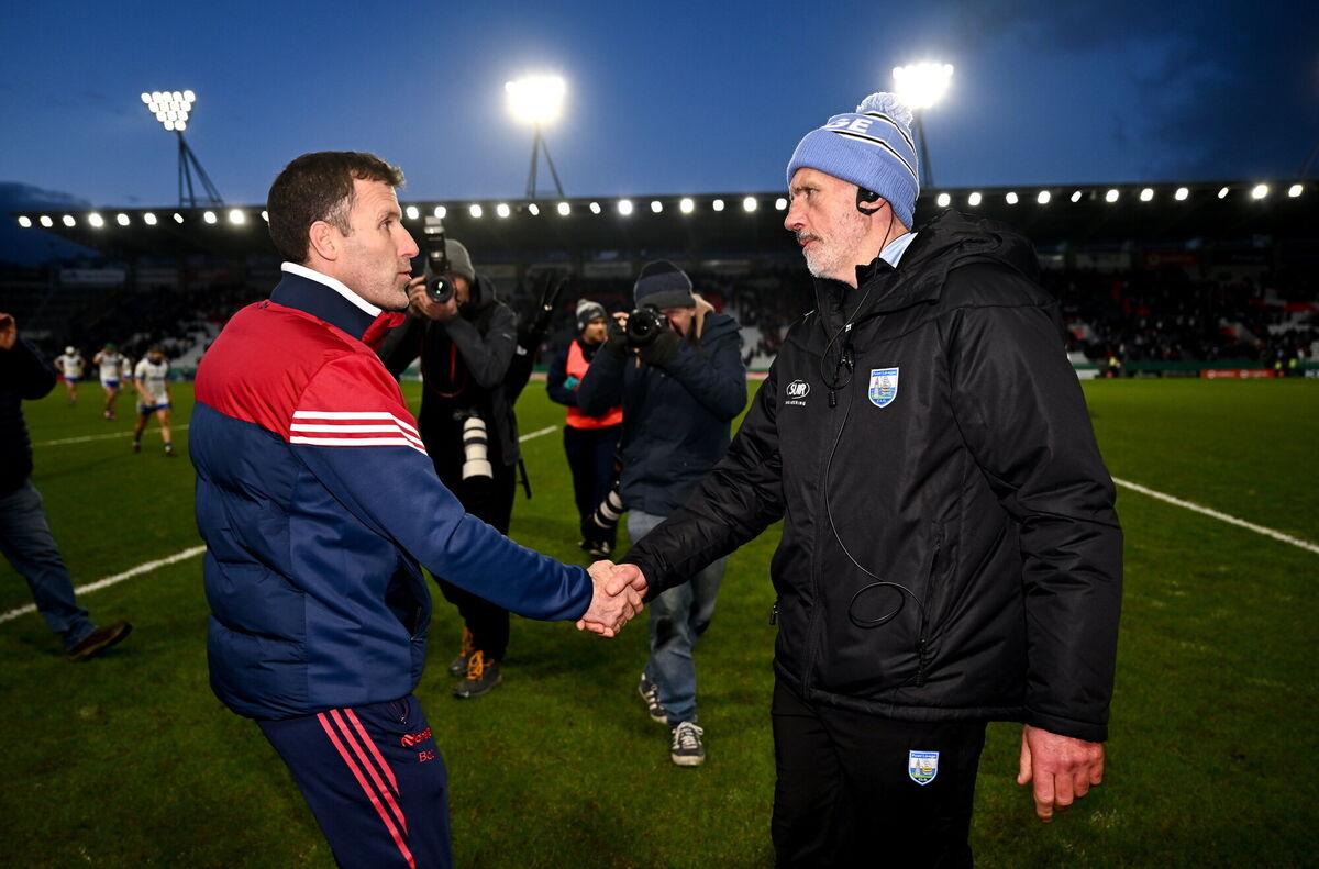 Cork manager Ben O'Connor, left, and Waterford manager Peter Queally shake hands after. Picture: Ben McShane/Sportsfile