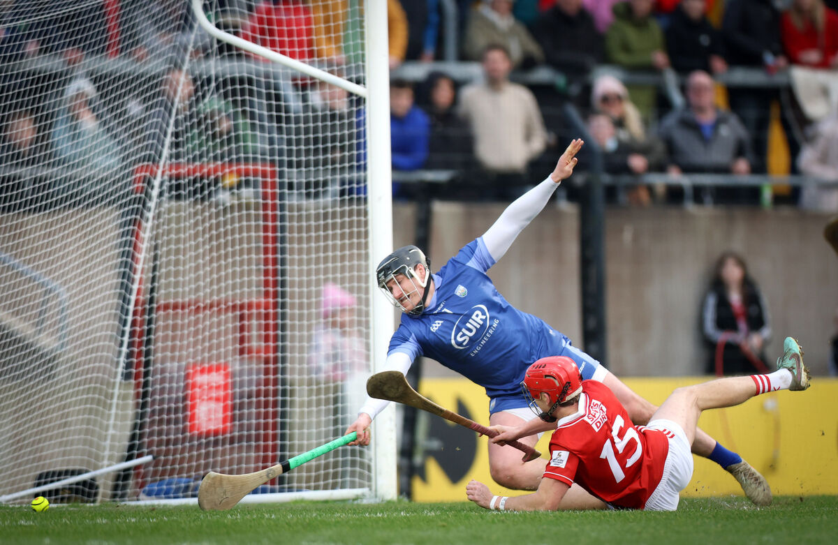 Cork's Alan Connolly scores his side’s first goal despite the efforts of Waterford keeper Billy Nolan. Picture: INPHO/Tom Maher