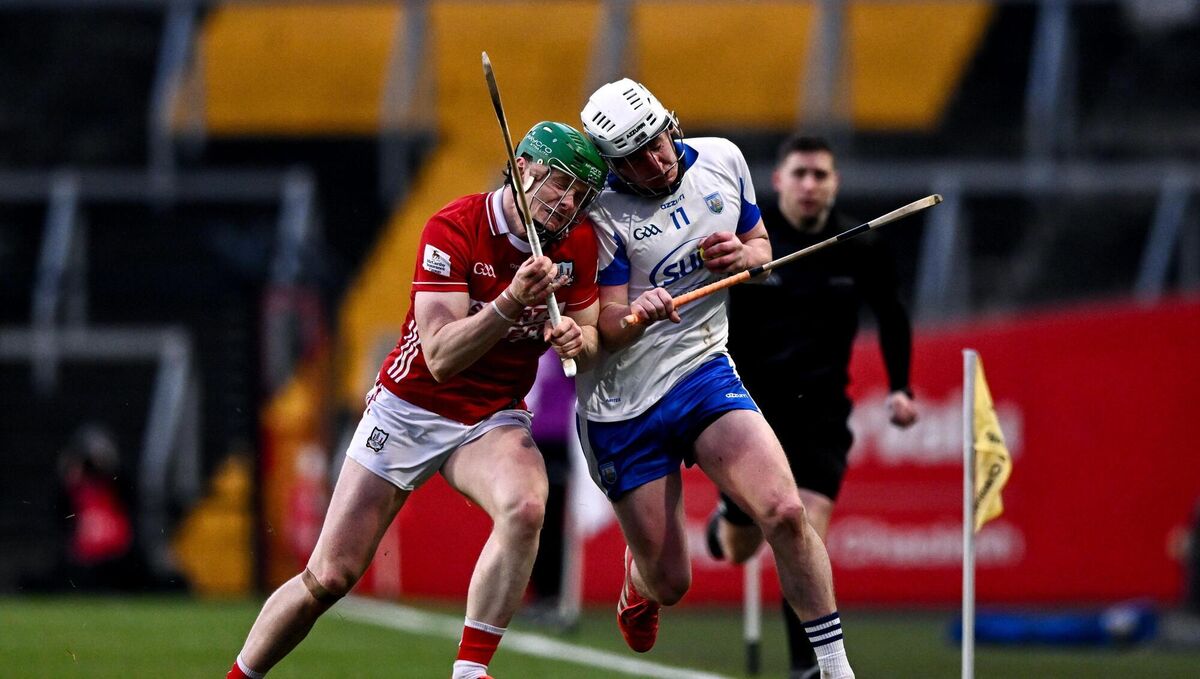Cork's Cormac O'Brien tackles Shane Bennett of Waterford. Picture: Ben McShane/Sportsfile