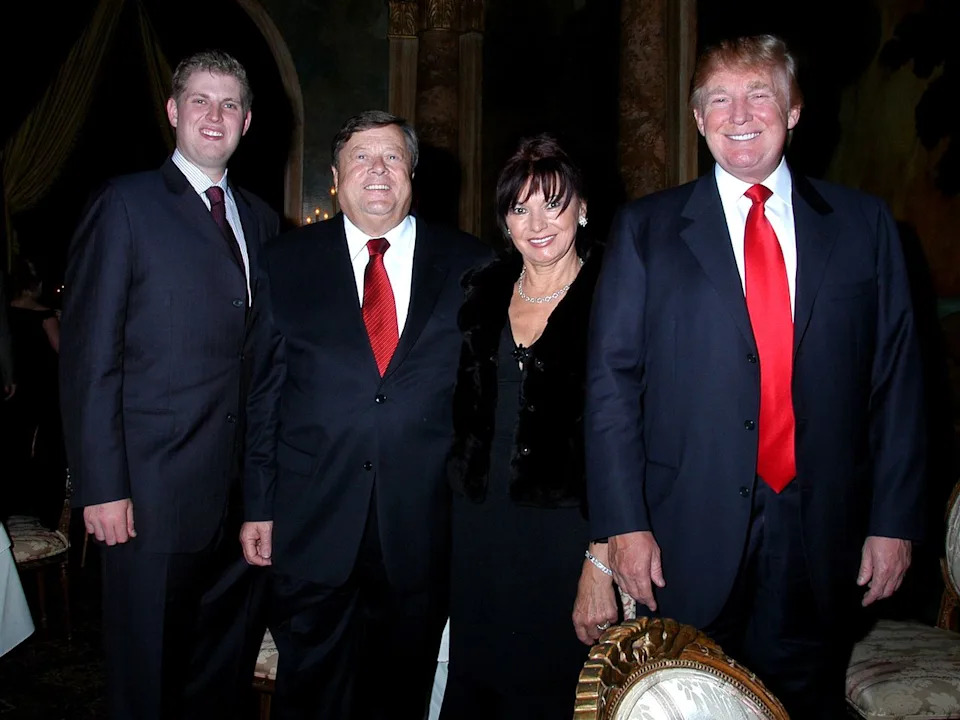 Eric Trump, Viktor and Amalija Knavs and Donald Trump on October 24, 2006 at the Mar-a-Lago estate. Davidoff Studios/Getty