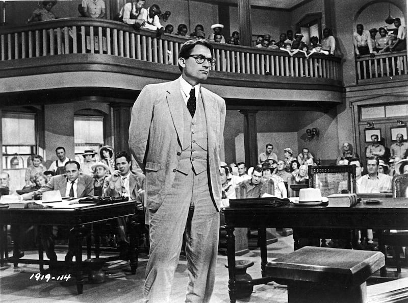 American actor Gregory Peck, as Atticus Finch, stands in a courtroom in a scene from director Robert Mulligan's film adaptation of To Kill A Mockingbird, 1962. Photograph: Universal Studios/Courtesy of Getty Images