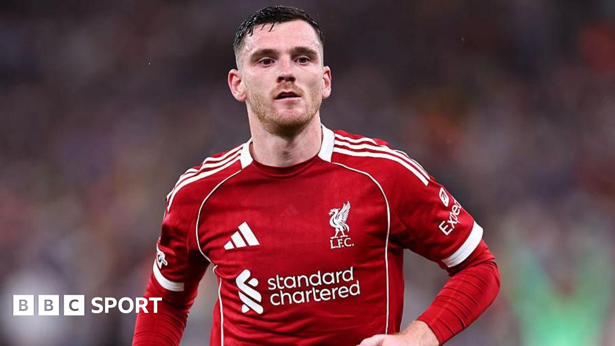 Andy Robertson wearing a red Liverpool match shirt