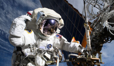 Astronaut Anne McClain is pictured near one of the International Space Station's main solar arrays