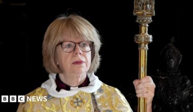 Dame Sarah Mullally wears gold and blue decorated robes as she conducts the Christmas Day Eucharist service at St Paul's Cathedral, London