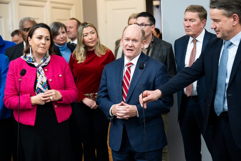 Greenlandic politician Aaja Chemnitz Arnatsiaq Larsen, US senator Chris Coons and Danish politician Christian Friis Bach at the Danish parliament, Christiansborg, in Copenhagen on Friday. Photograph: Martin Sylvest Andersen/Getty Images