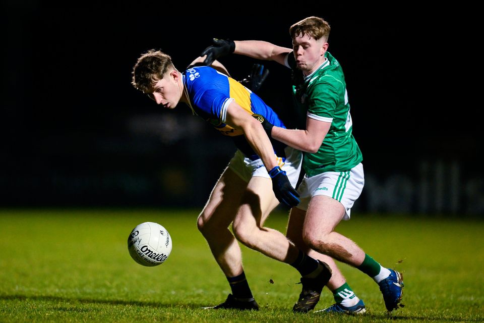 Eoin O’Connell of Tipperary holds off the challenge of Fintain McNamara of Limerick during the McGrath Cup match at Mick Neville Park in Rathkeale. Photo: Brendan Moran/Sportsfile