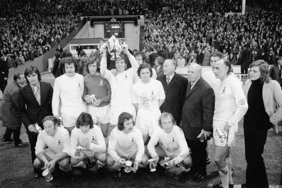 Tottenham Hotspur celebrate with the League Cup after their 1-0 win: (back row, l-r) John Pratt, Cyril Knowles, Pat Jennings, Martin Peters, Mike England, Steve Perryman, manager Bill Nicholson, Martin Chivers, Alan Gilzean; (front row, l-r) Ralph Coates, Joe Kinnear, Terry Naylor, Phil Beal