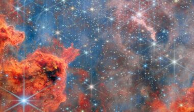 A glittering starscape in pink and blue taken by the Webb telescope