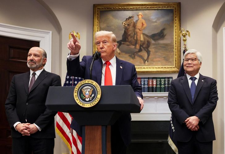 U.S. President Donald Trump speaks as C.C. Wei, right, chairman and CEO of Taiwan Semiconductor Manufacturing Co., and U.S. Commerce Secretary Howard Lutnick listen in the Roosevelt Room of the White House in Washington, March 3, 2025. AP-Yonhap