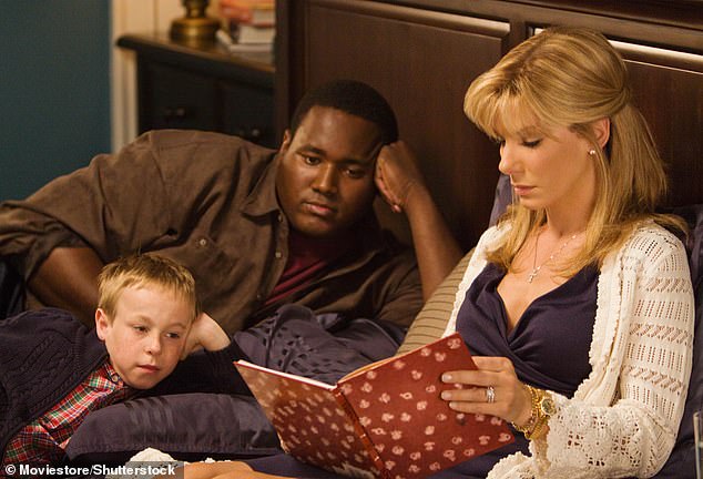 Aaron is best known for playing former NFL star Michael Oher in The Blind Side, in which he is pictured with Bullock, who won an Oscar for her performance, and child actor Jae Head