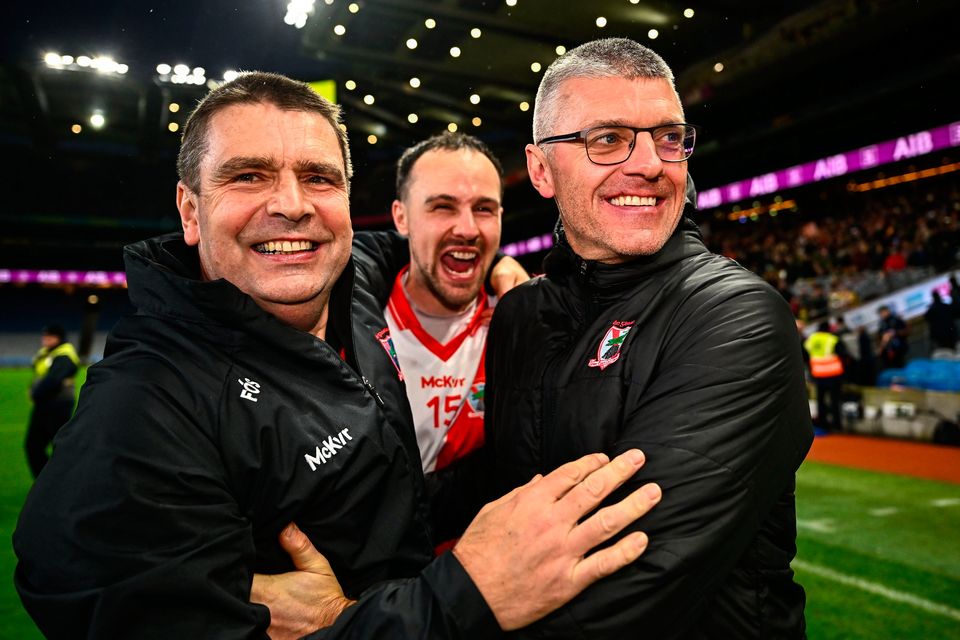 An Ghaeltacht manager Fergal Ó Sé (left), footballer Seán Ó Gairbhí and selector Aodán Mac Gearailt celebrate at Croke Park. Photo: Sportsfile