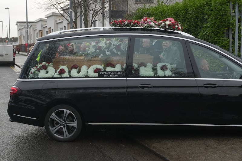The funeral cortege arrives at St Oliver Plunkett's Church in Rivermount, Dublin, on Friday. Photograph: Brian Lawless/PA Wire