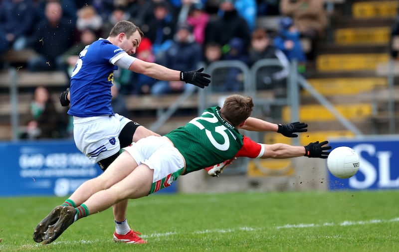 Jack McCarron scores a goal for Scotstown. Photograph: James Crombie/Inpho