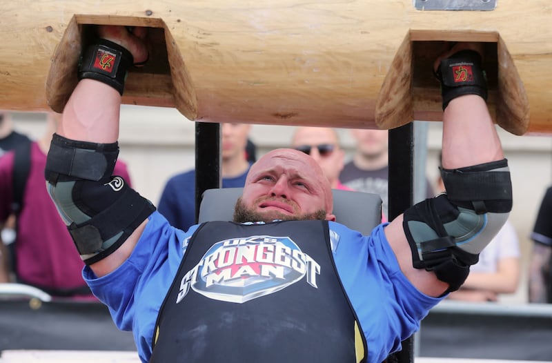 Pa O'Dwyer from Limerick lifts a log during the UK Strongest Man 2016 heats at Belfast City Hall, Belfast. Photograph: Niall Carson/PA