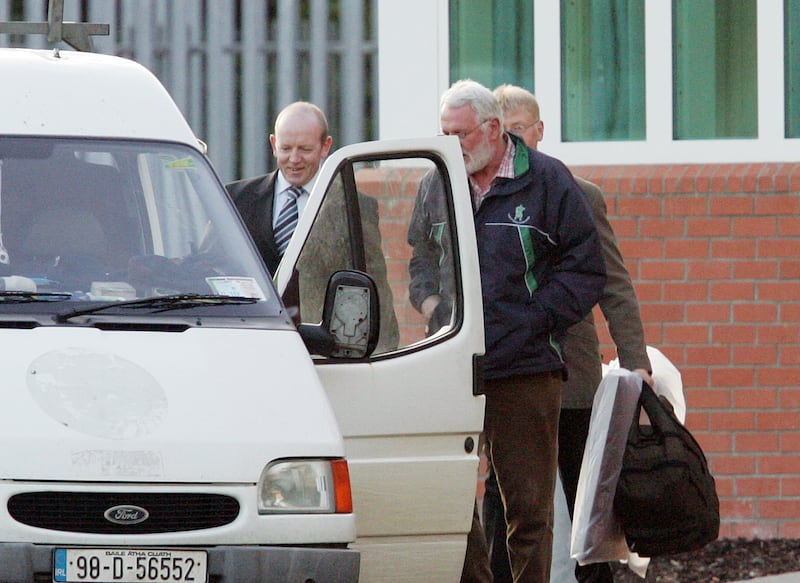 Martin Ferris (centre) of Sinn Féin at Castlerea Prison picking up Pearse McAuley, left, and Kevin Walsh, who were freed after serving their sentences for the killing of Det Jerry McCabe.  Photograph: Alan Betson